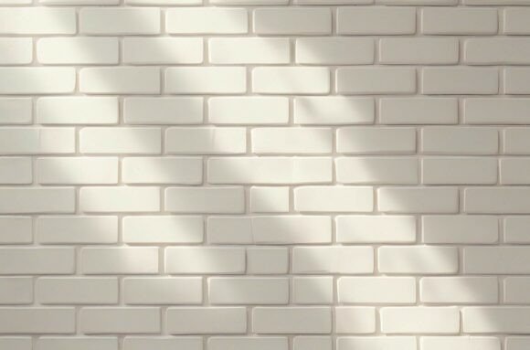 A White Brick Wall with Sunlight Coming